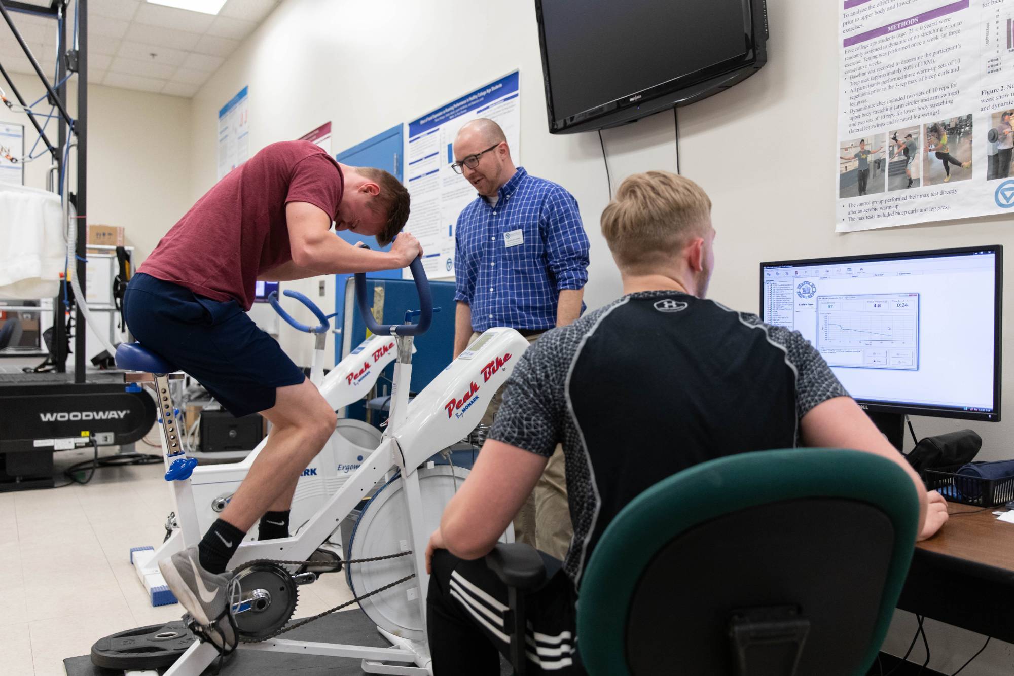 Wingate test performed by student while faculty and other student looks on